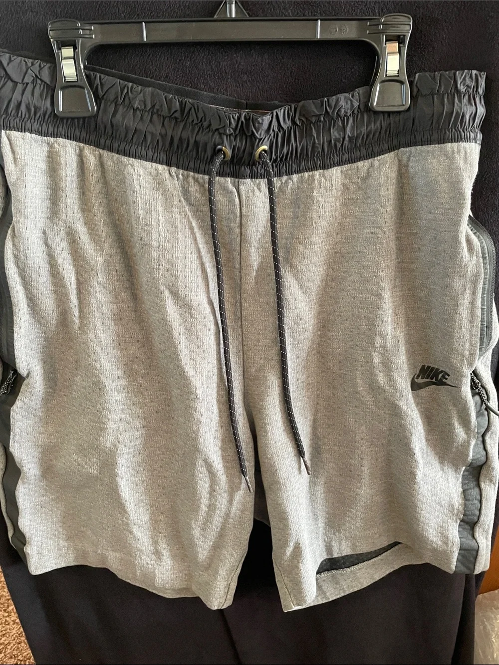 Nike Men's Gray Athletic Shorts with Black Waistband and Drawstring